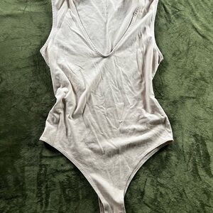 Cream Sleeveless Cut Out Bodysuit